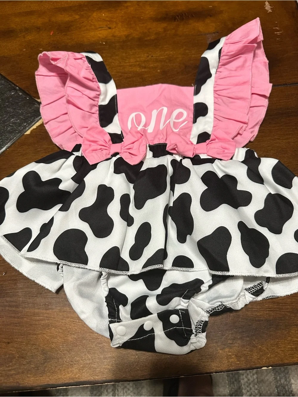Pink & Black Cow Print Ruffle Baby Romper - One Design